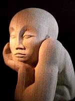 Sculpture carved in sandstone entitled 'daydreamer'